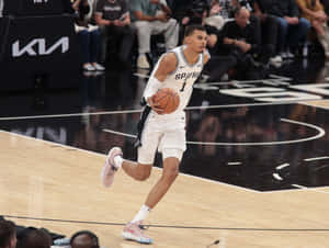 Basketball_ Player_ In_ Action_ Spurs Wallpaper