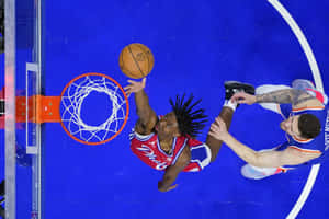 Basketball Player Layup Aerial View Wallpaper