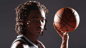 Basketball Player Portraitwith Ball Wallpaper