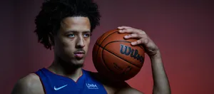 Basketball Player Portraitwith Ball Wallpaper