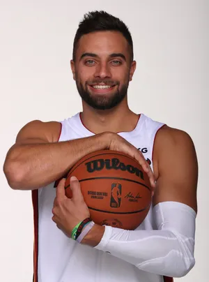 Basketball Player Portraitwith Ball Wallpaper