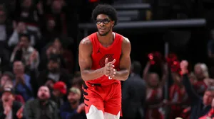 Basketball Player Red Uniform Action Shot Wallpaper