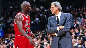 Basketball Playerand Coach Discussion Wallpaper