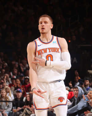 Basketball Playerin Action New York Uniform Wallpaper