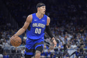 Basketball Star - Aaron Gordon In Action Wallpaper