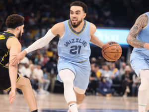 Basketball Star Tyus Jones Wallpaper