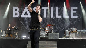 Bastille Performing Live At A Magnificent Concert Wallpaper