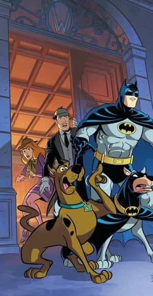 Batman And Blue Beetle Teaming Up In An Action-packed Scene In Batman: The Brave And The Bold Wallpaper