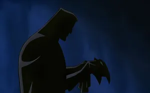 Batman And Phantasm In An Intense Standoff Wallpaper