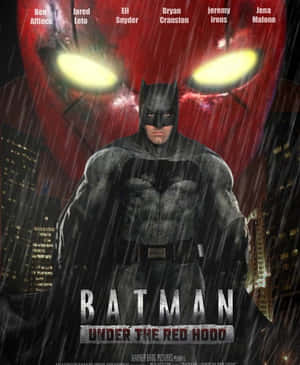Batman And Red Hood Face Off In An Intense Battle Wallpaper
