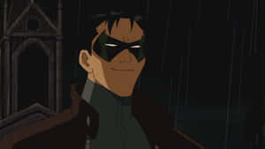 Batman And Red Hood Face-off In Epic Battle Wallpaper