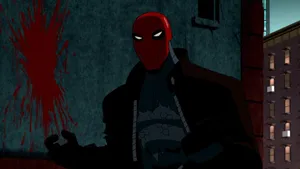 Batman And Red Hood Face Off In Epic Battle Wallpaper