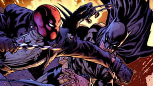 Batman And Red Hood Face Off In Intense Battle Wallpaper