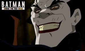 Batman And Red Hood Face-off In Intense Showdown Wallpaper