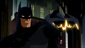 Batman And Red Hood Face Off In The Dark City Wallpaper