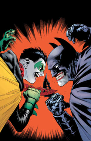 Batman And Robin Face-off In An Intense Battle Wallpaper