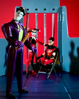 Batman Beyond Faces The Joker In A Thrilling Showdown Wallpaper