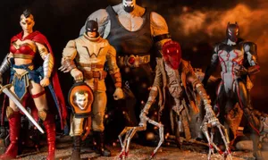 Batman In A Post-apocalyptic World Surrounded By Enemies And Chaos Wallpaper