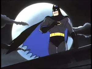 Batman Standing On Top Of A City Building, Overlooking Gotham City In Batman Animated Adventures. Wallpaper