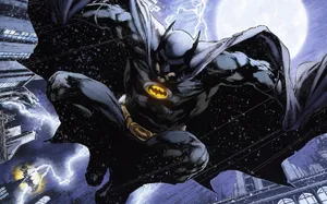 Batman Stands Vigilant Atop The Night Sky Wallpaper