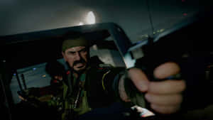 Battle-ready Frank Woods In Action Wallpaper