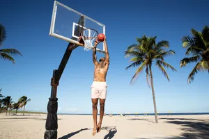 Beach Basketball Dunk Action Wallpaper