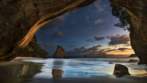 Beach Night Under The Cave Wallpaper