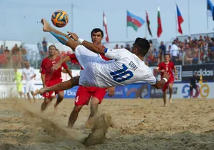Beach Soccer Acrobatic Kick Wallpaper