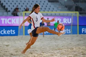 Beach Soccer Action Shot Wallpaper