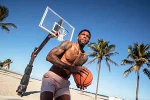 Beachside Basketball Player Wallpaper