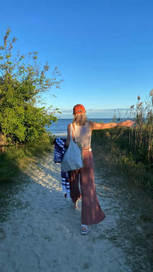 Beachside Bohemian Chic Woman Walking Wallpaper