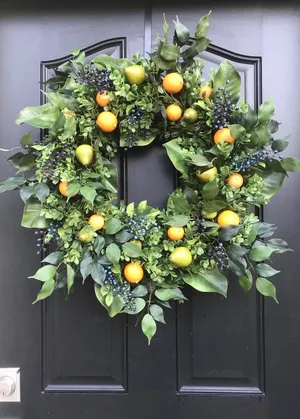 Beautiful And Vibrant Spring Wreaths On Display Wallpaper