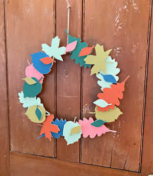 Beautiful Autumn Fall Wreath On A Wooden Door Wallpaper