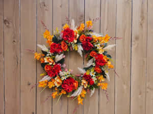 Beautiful Autumn Fall Wreath On A Wooden Door Wallpaper
