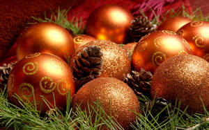 Beautiful Christmas Balls In Bronze Wallpaper