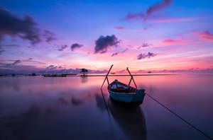 Beautiful Cool Boat And Purple Sunset Wallpaper