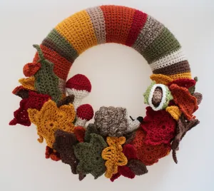 Beautiful Fall Wreath On Rustic Wooden Door Wallpaper