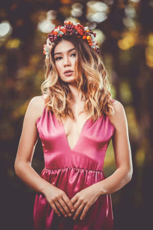 Beautiful Floral Crown On A Rustic Wooden Background Wallpaper