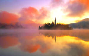 Beautiful Foggy Sunset At Lake Bled Wallpaper