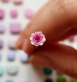 Beautiful Miniature Roses In Full Bloom Wallpaper