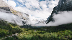 Beautiful Mountain View By The Clouds Desktop Wallpaper