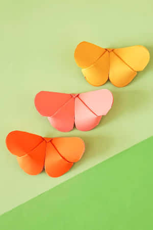 Beautiful Origami Butterfly On Pink Background Wallpaper