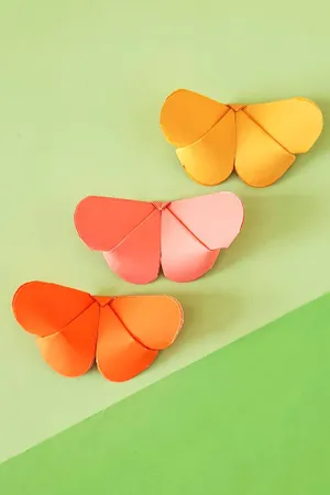 Beautiful Origami Butterfly On Pink Background Wallpaper