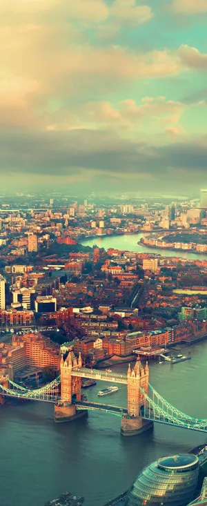 Beautiful River Scene In Spring With Blooming Mountain Wildflowers. Wallpaper