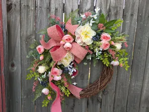 Beautiful Spring Wreath On A Rustic Wooden Door Wallpaper