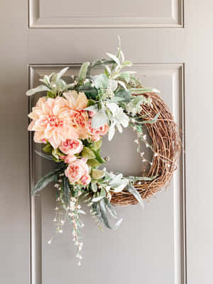 Beautiful Spring Wreath On Pastel Painted Door Wallpaper