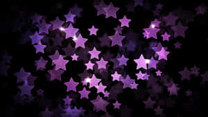 Beautiful Twinkling Of Purple Star Wallpaper