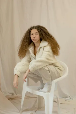 Beige Aesthetic Womanin Cream Outfit Wallpaper