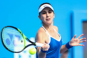 Belinda Bencic In Blue Tennis Top Wallpaper