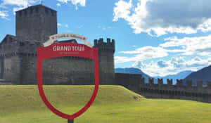 Bellinzona Castle Overlooking The Stunning Panorama Of Ticino, Switzerland Wallpaper